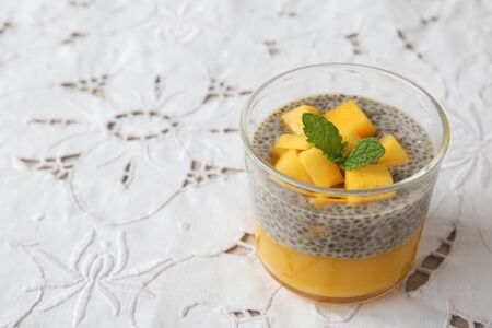 Homemade Chia seed pudding with mango, selective focus, toningの写真素材