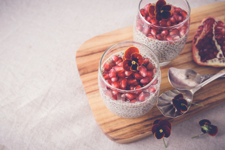 Chia seeds pudding with pomegranate, selective focus,toningの写真素材