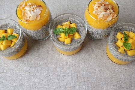 Homemade Chia seed pudding with mango, selective focus, toningの写真素材