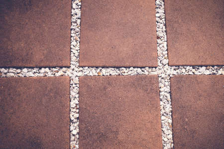 Paving Pebble Patio in rows, selective focus, toningの写真素材