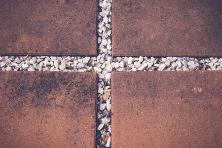 Paving Pebble Patio in rows, selective focus, toningの写真素材