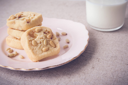 Homemade ginger and pine nut cookies, selective focus, toningの写真素材