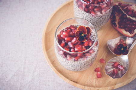 Chia seeds pudding with pomegranate, selective focus,toningの写真素材