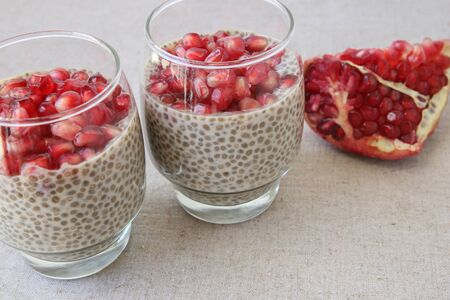 Chia seeds pudding with pomegranate and cherries, selective focusの写真素材