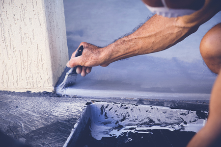 Hand painting garage floor, soft selective focus, toningの写真素材