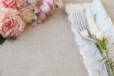 Pink Carnation flowers table setting copy space background,toning