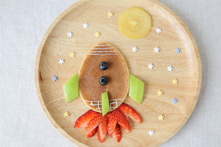 Rocket, moon and stars pancake breakfast, fun food art for kidsの写真素材