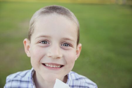 Happy little boy in the parkの写真素材