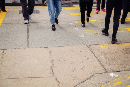 crossroad with walking pedestrians, toningの写真素材