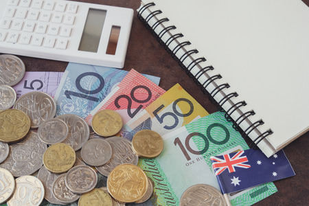 Australian money, AUD  calculator, and notebookの写真素材