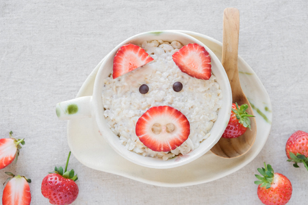 pig oatmeal porridge breakfast, fun food art for kidsの写真素材