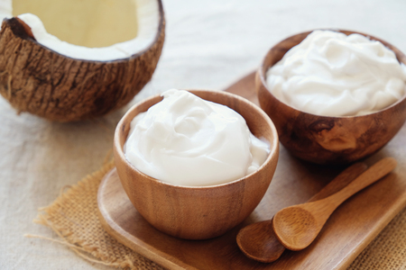 organic coconut yogurt in wooden bowl, dairy free yogurt, probiotic food