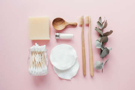 Bamboo earbuds, toothbrushes, natural floss, cotton makeup removal pads, shampoo and soad bars, plastic free, zero waste, reusable products for bathroomの写真素材