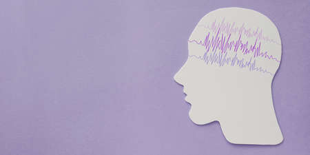 encephalography brain paper cutout with purple ribbon, Epilepsy awareness, seizure disorder, mental health conceptの写真素材