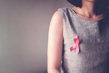 women with pink ribbon, breast cancer awareness, October pink conceptの写真素材
