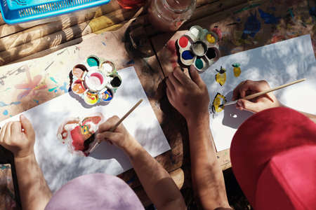 Kids painting art outdoor activity, montessori homeschooling educationの写真素材