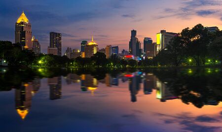 cityscape of building from park at night.の写真素材