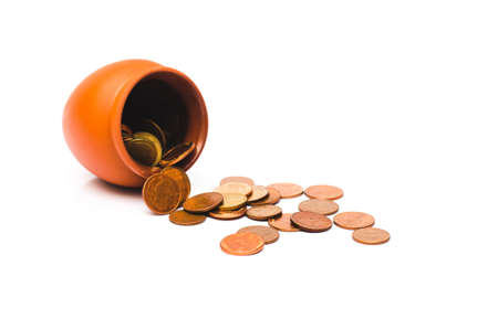 copper coin overflow from brown vase. investment concept.の写真素材