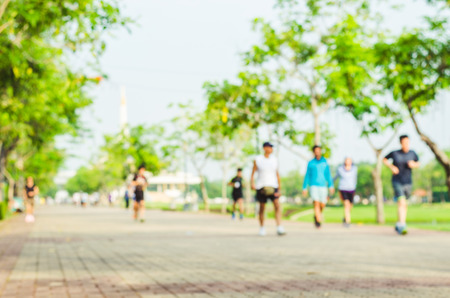 blur many people group exercise with running or jogging on the morning in the park for healthy.の写真素材
