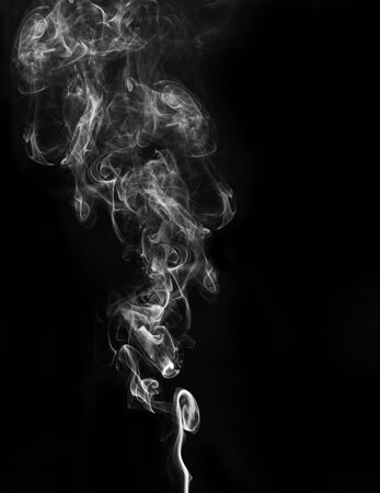 abstract fragment movement of burn white smoke on black background.の写真素材
