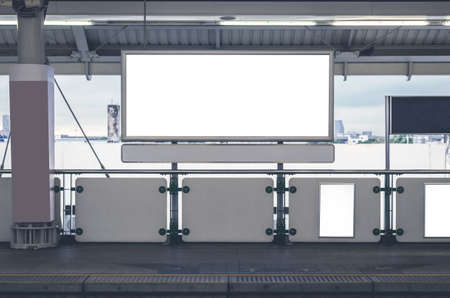 billboard big blank white LED screen horizontal outstanding in subway side pathway people walking to...