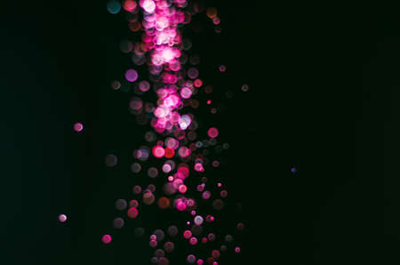 abstract bright colorful violet and red or magenta bokeh glitter sparkle blurred background. like...