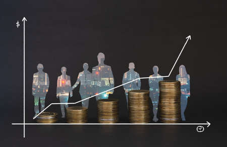 double exposure of business leadership teamwork of finance investment concept coin stacking and night cityscape background with analysis growth up chart white graph profit successful for investor.の写真素材