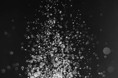 abstract bright no color black and white bokeh glitter sparkle blurred background. like molecule spread and absorb.の写真素材
