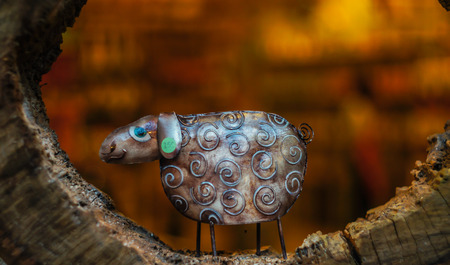 vintage style of engraving (Metal-work) sheep shape  steel with blur backgroundの写真素材