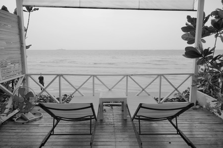 black and white beach chair at seaside porchの写真素材