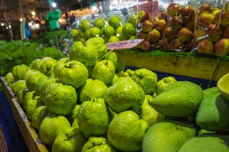 guava on fruit shelf sale in night fairの写真素材