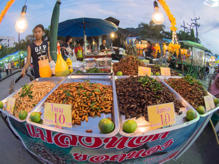 fish eye view, fried insect shop, fair on urban of  Thailand such as Loy Kra Thong fair occurred ten days in  twelfth lunar month, new year festival , anniversary establishedのeditorial素材