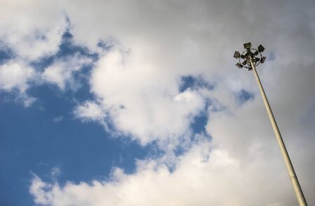 spotlight post (high mast) on sky and cloud background