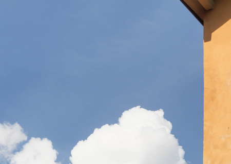 cloud far from the orange wall