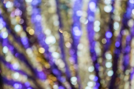 out of focus, gold  braid on blue clothの写真素材