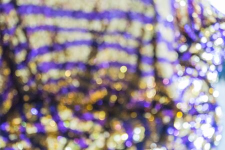 out of focus, gold  braid on blue clothの写真素材