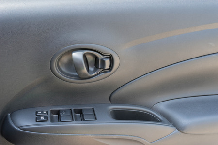 window control button beside door carの写真素材