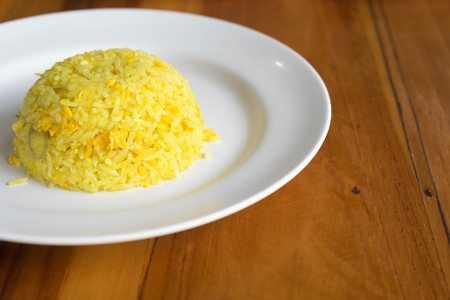 fried rice with curcuma and eggの写真素材