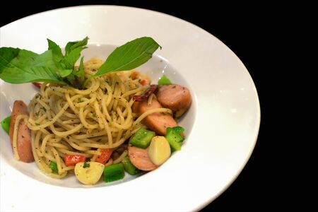 spaghetti black pepper chicken sausageの写真素材