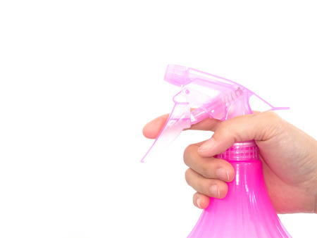 right hand hold pink sprayerの写真素材