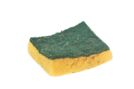 Old yellow sponge on a white background.の写真素材