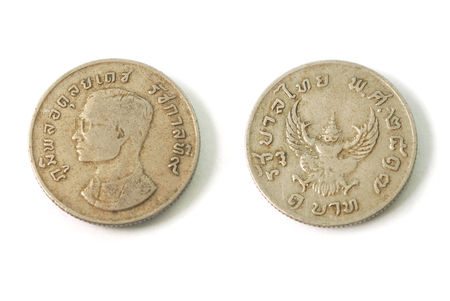 Ancient Thai baht 1 coin placed on a white background.の写真素材