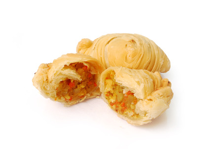 Curry puff coil on white background.(with Clipping Path).の写真素材