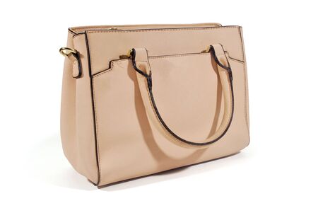 Cream color leather bag on a white background.の写真素材
