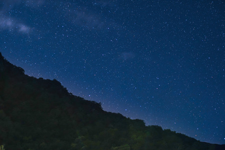 The stars in the sky are mountains in the foreground.