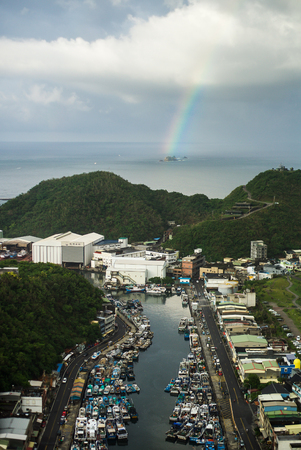 Rainbow over the bayの写真素材