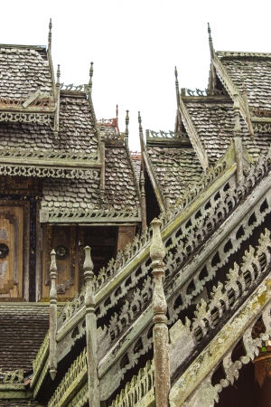 the very old wooden temple of Myanmar in chiang khum, thailandの写真素材
