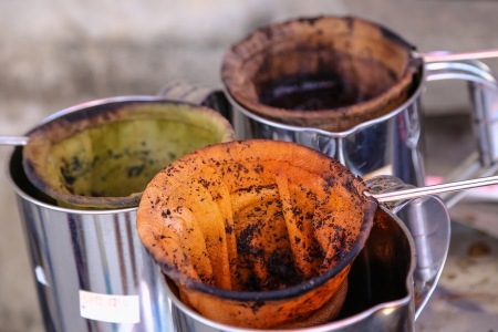 Thai style old tea bag in old coffee shopの写真素材