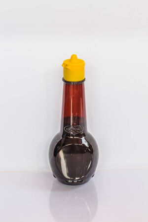 Sauce bottle isolated white backgroundの写真素材