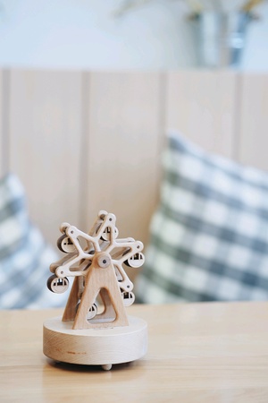 Wooden ferris wheel on a tableの素材
